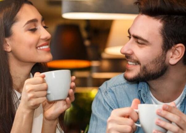 Adults having coffee, representing a calmer and more deliberate browsing approach